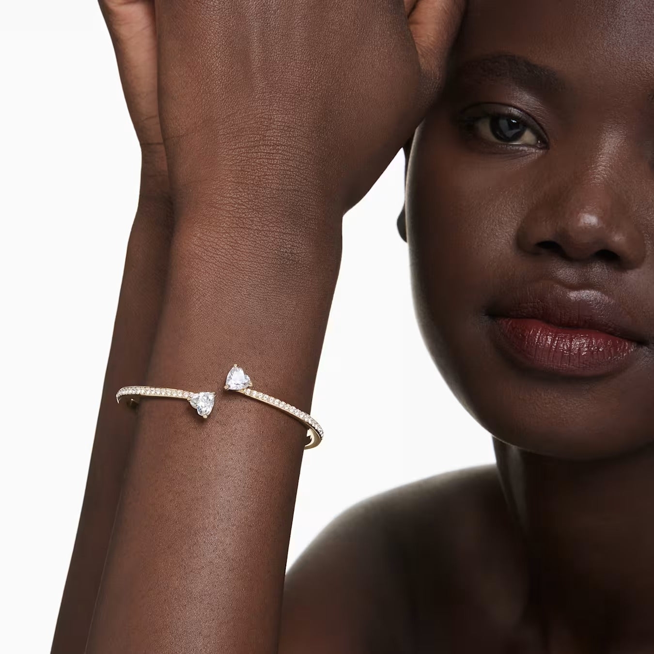 Bracciale rigido Mesmera Attract Cuori Placc oro